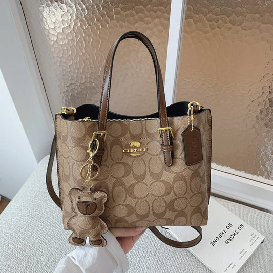 💥 40% Off 💥 Elegant minimalist Parisian-style crossbody bag for women, classic design, PU leather material.