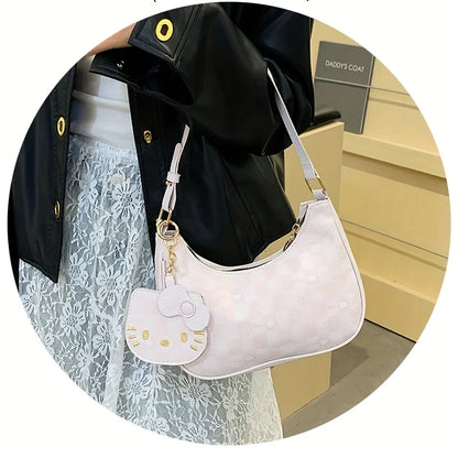 💥 53% Off 💥 Sanrio's new cute pink Hello Kitty shoulder bag for girls in 2026, a versatile and fashionable shoulder bag for little girls.